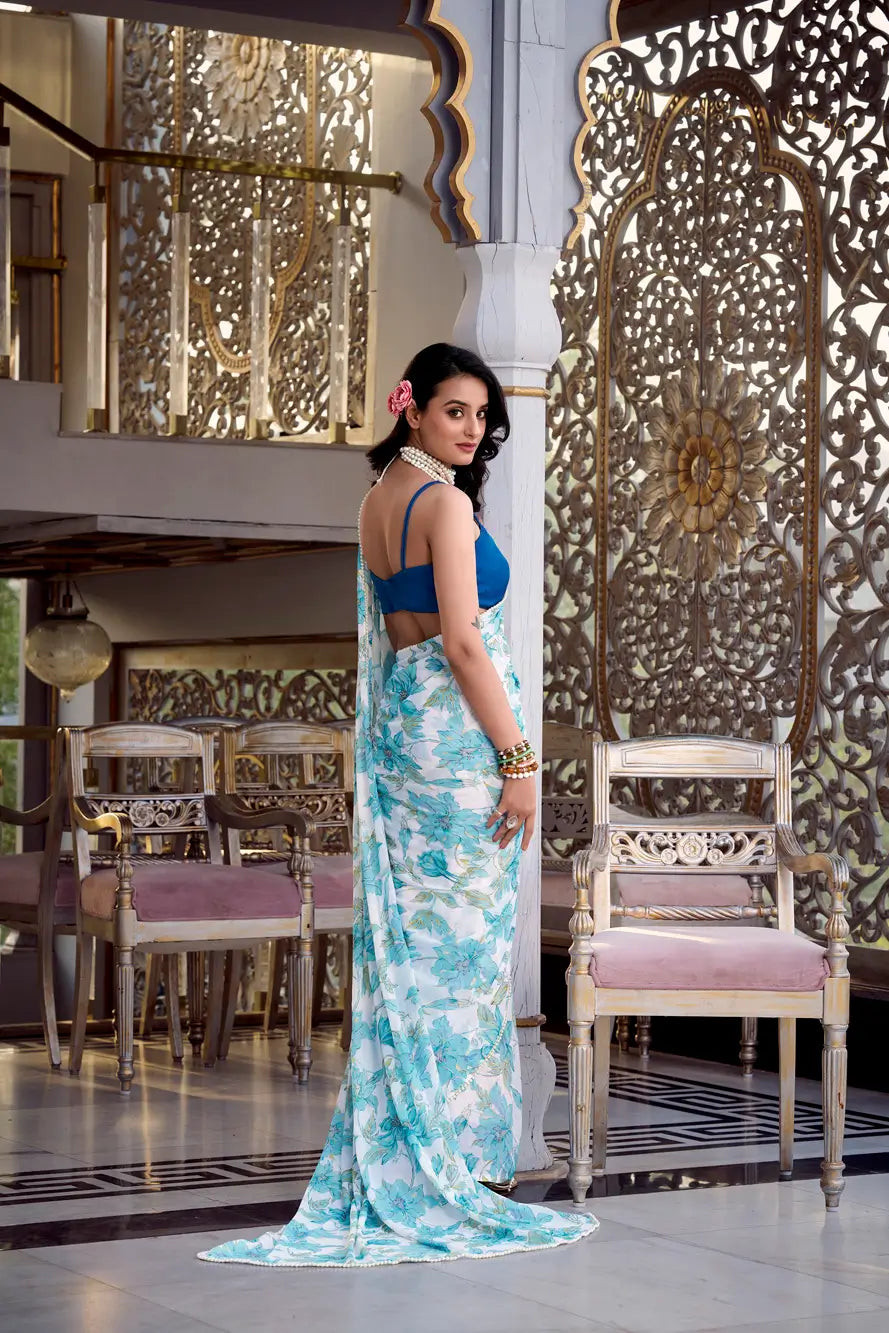 Sea Blue Weightless Marbal Saree With Floral Print &  Pearl Lace Border
