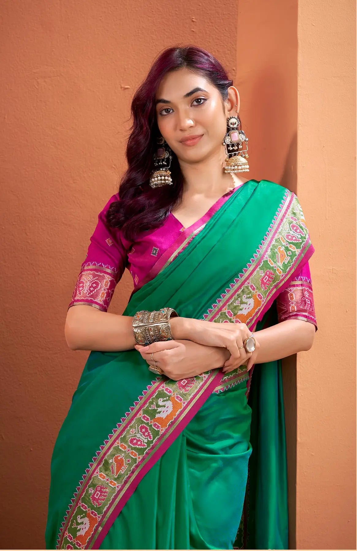 Dark Green Silk Patola Weaving Saree with Attractive Border