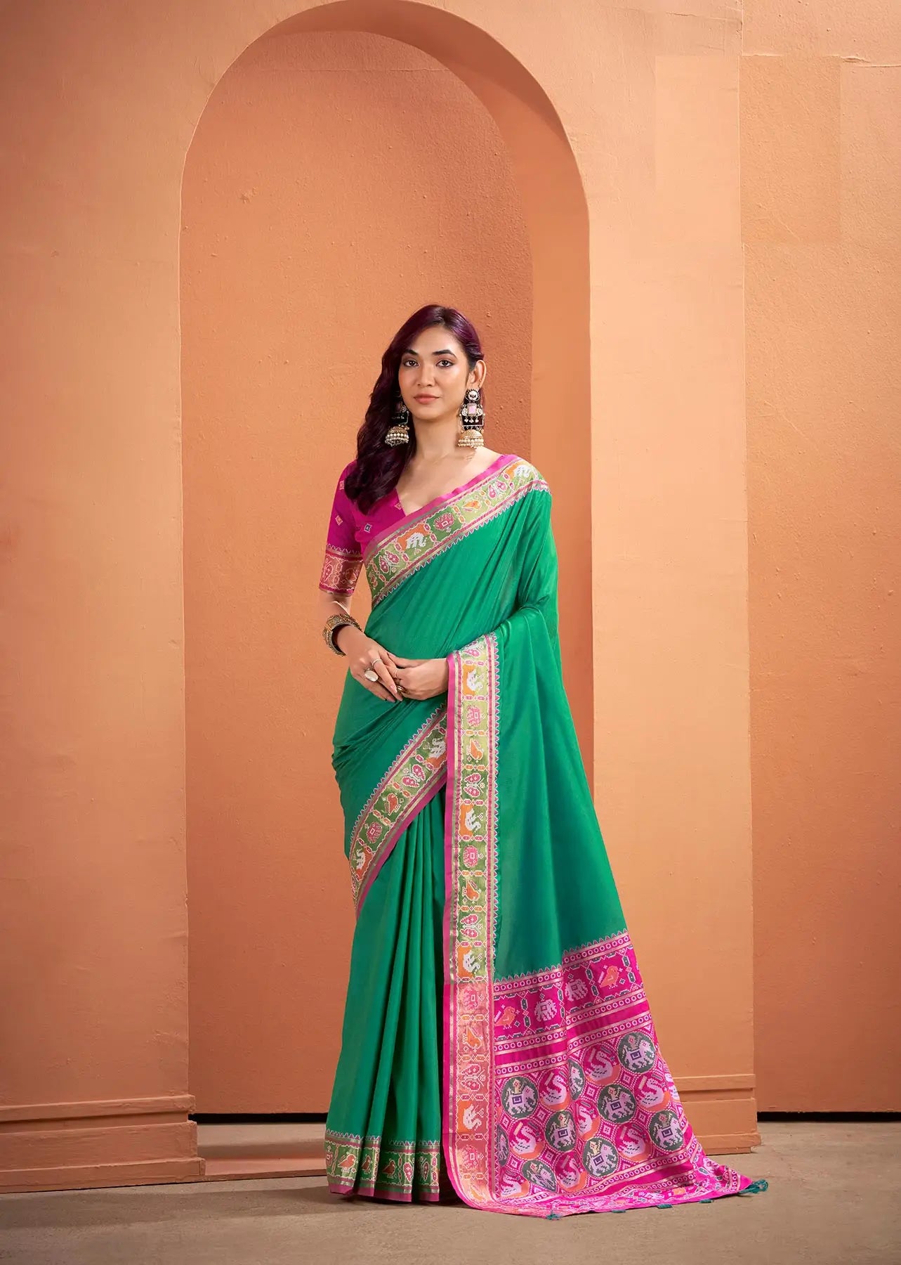 Dark Green Silk Patola Weaving Saree with Attractive Border