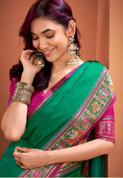 Dark Green Silk Patola Weaving Saree with Attractive Border
