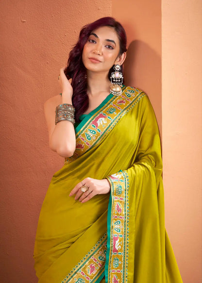 Yellow  Silk Patola Weaving Saree with Attractive Border