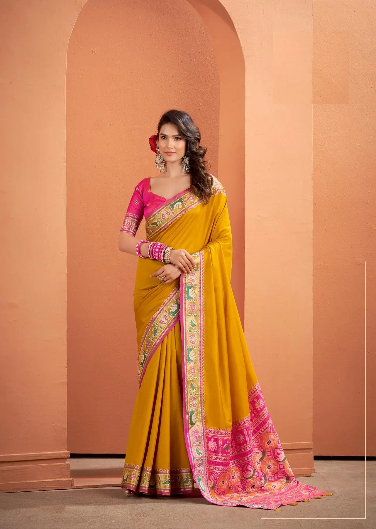 Mustard Yellow Silk Patola Weaving Saree with Attractive Border