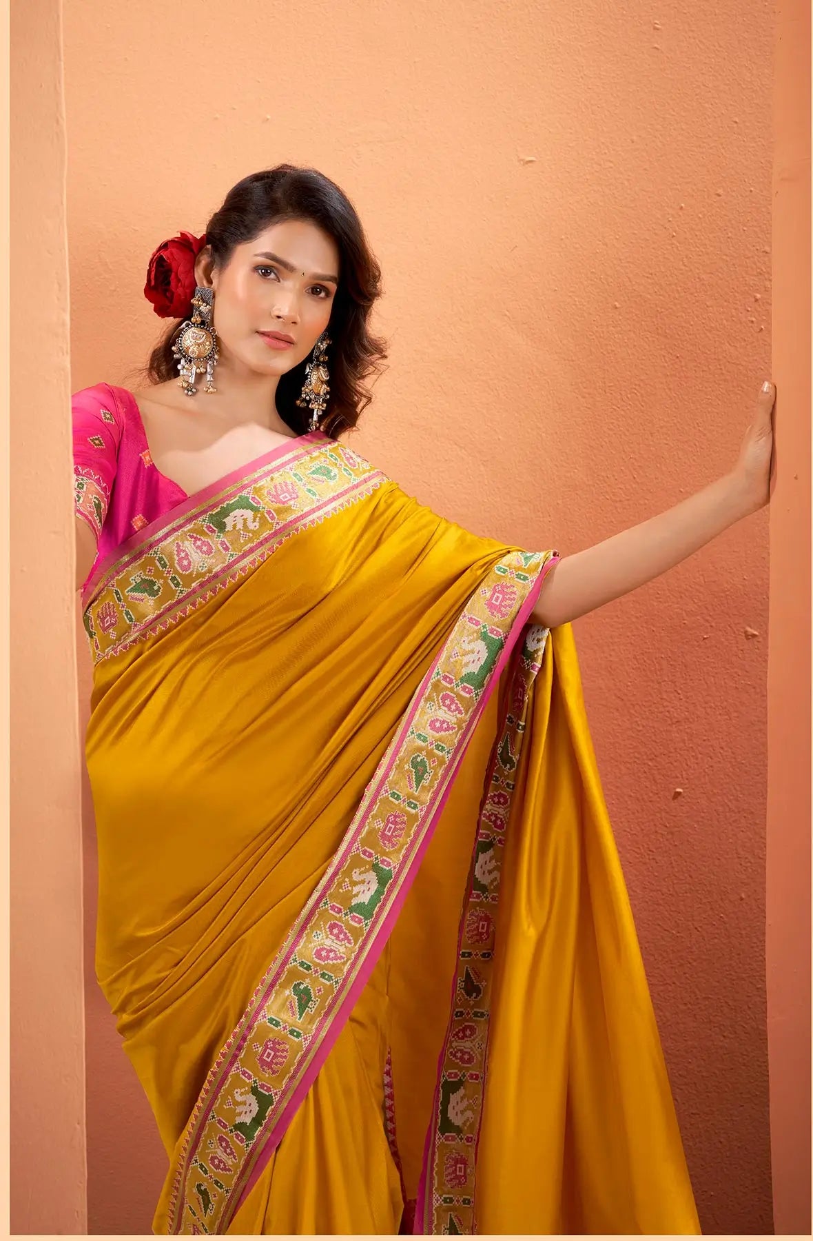 Mustard Yellow Silk Patola Weaving Saree with Attractive Border