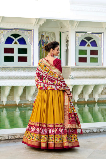 Mustard Tussar Silk Lehenga Choli With Patola Print And Foil Work