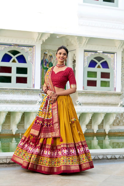Mustard Tussar Silk Lehenga Choli With Patola Print And Foil Work