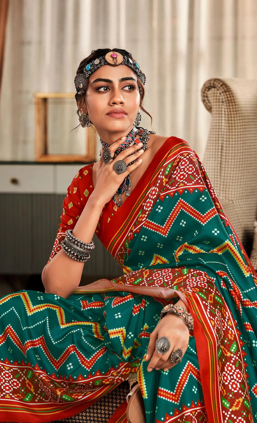 Dark Green  Handloom Silk Saree with Patola Print & Tassel Pallu