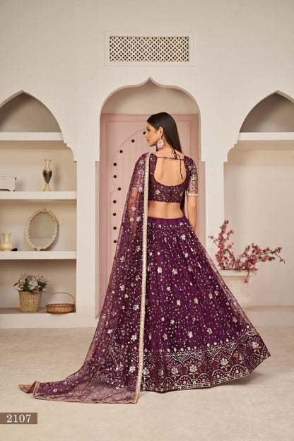 Wine Net Lehenga Choli With White Cotton Thread Work, Zari Work & Sequence Work