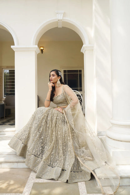 Ivory Net Lehenga Choli With Cotton Thread Work & Sequence Embroidery Work