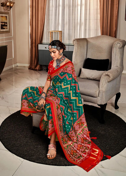 Dark Green  Handloom Silk Saree with Patola Print & Tassel Pallu
