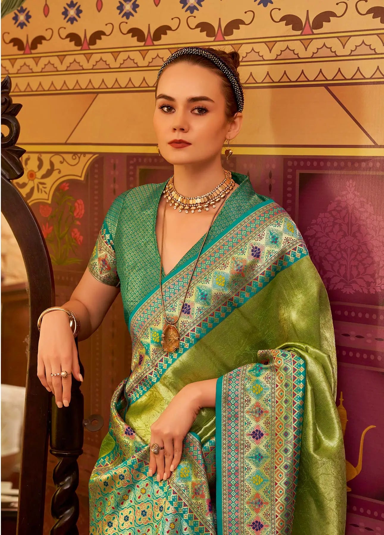 Green Fancy Tissue Silk Saree with  Zari Weaving