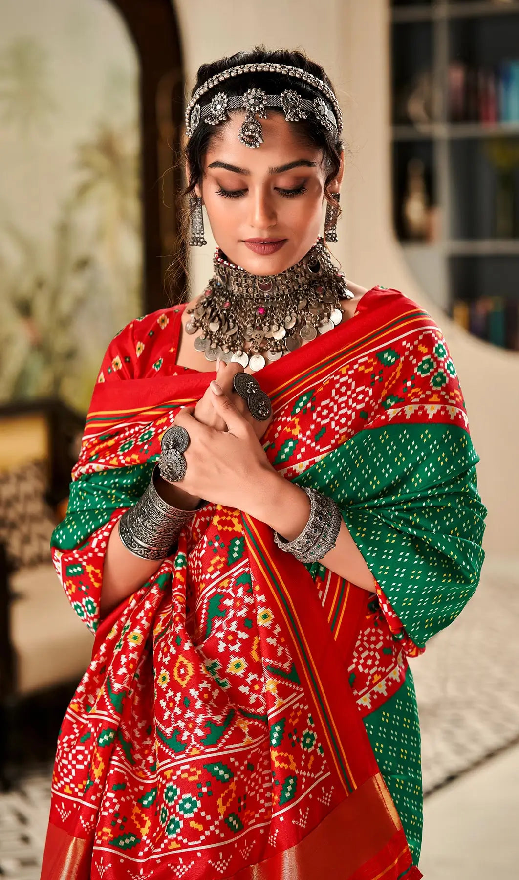 Dark Green  Handloom Silk Saree with Patola Print & Tassel Pallu