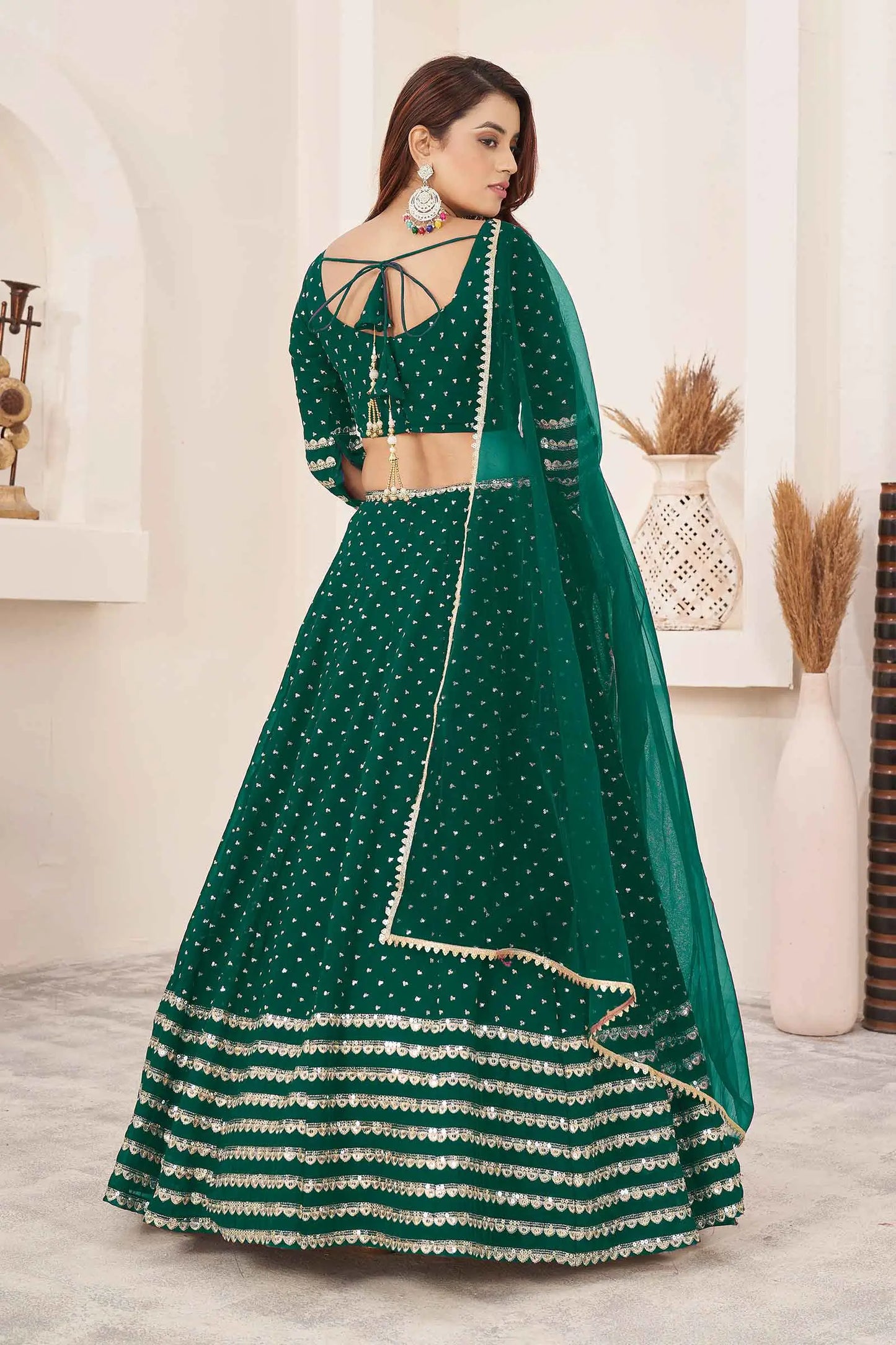 Teal Green Georgette Lehenga With Zari And Sequins Embroidery Work