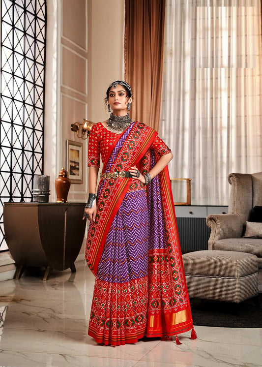 Purple Handloom Silk Saree with Patola Print & Tassel Pallu