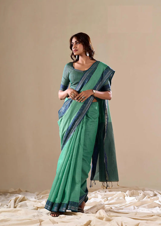 Teal Green Handloom Silk Saree With Contarast Border