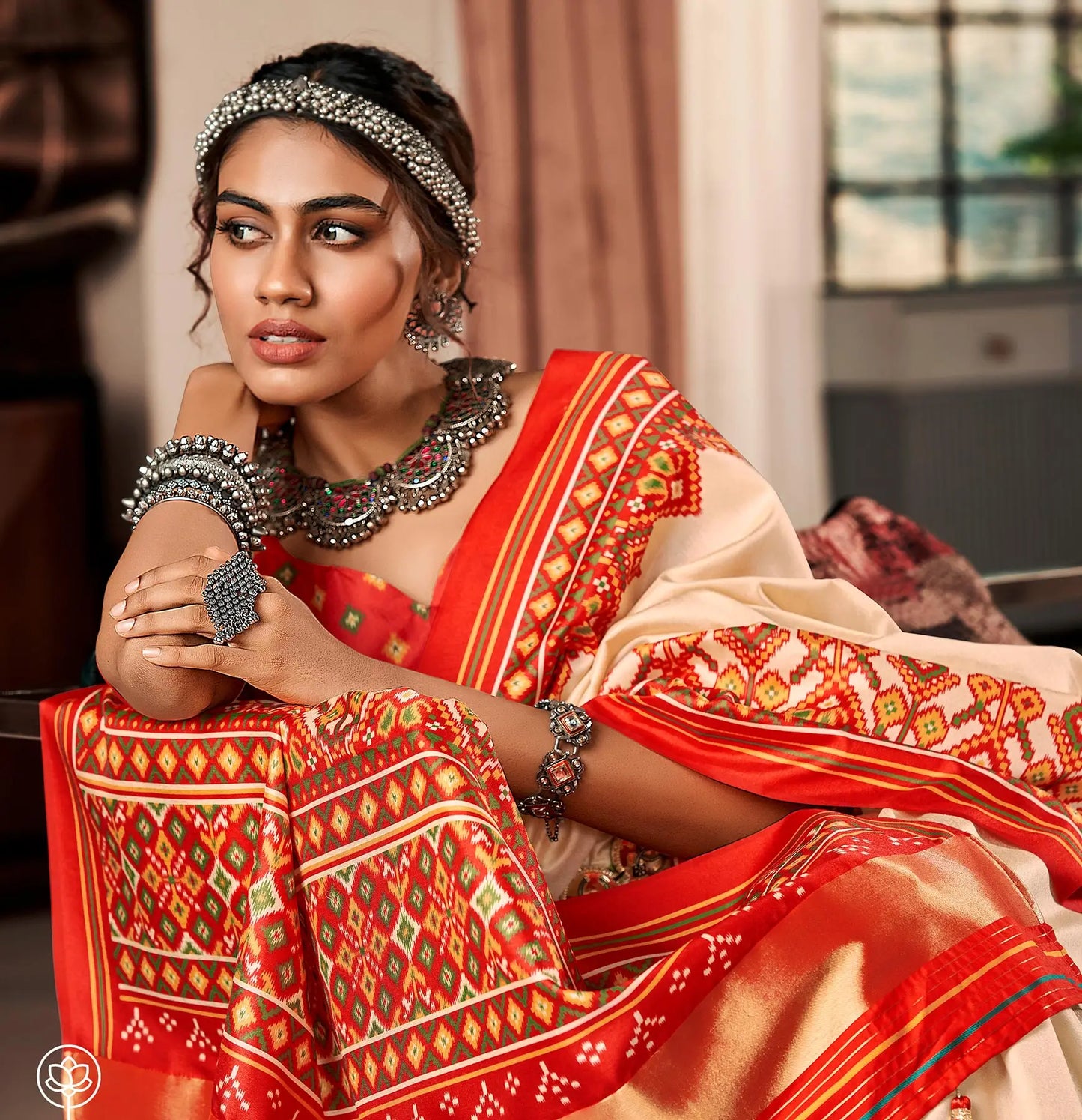 Beige Handloom Silk Saree with Patola Print & Tassel Pallu