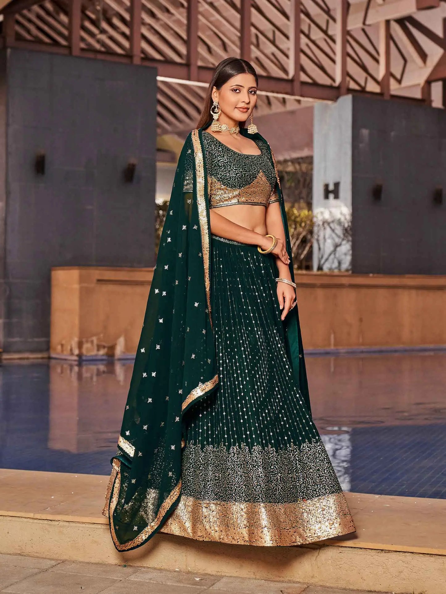 Green Georgette Lehenga With Multiple Sequins  And Thread Embroidery Work