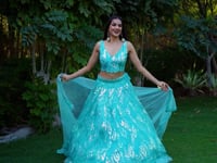 Sky Blue Soft Net Lehenga With Multiple Sequins And Thread Embroidery Work