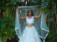 White Soft Net Lehenga With Multiple Sequins And Thread Embroidery Work