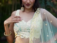 Yellow Soft Net Lehenga With Multiple Sequins And Thread Embroidery Work