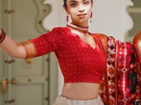 Beige Tussar Silk Lehenga Choli With Patola Print And Foil Work