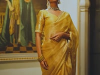 Golden Shimmer Tissue Saree With Zari Weaving Work & Sequins Lace Border